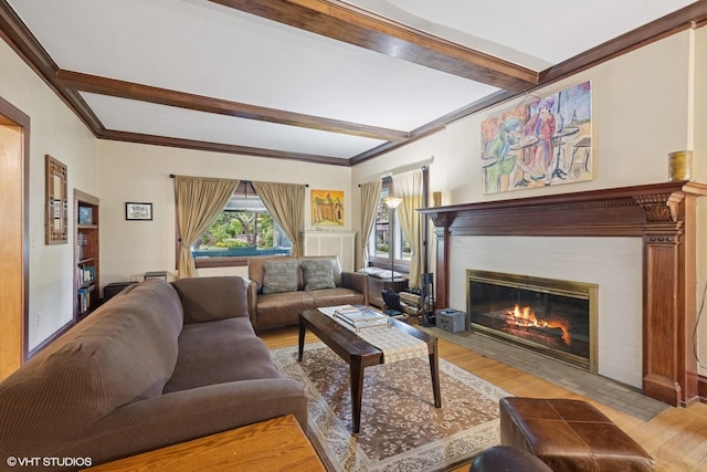 710 W Downer Pl, Aurora, IL 60506 - living room with a fireplace, wood finished floors, and beamed ceiling