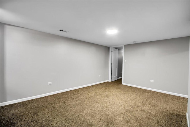 22255 Merrill Ave, Sauk Village, IL 60411 - spare room featuring baseboards and dark colored carpet