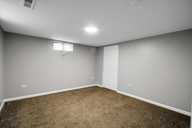 22255 Merrill Ave, Sauk Village, IL 60411 - below grade area with dark colored carpet and baseboards