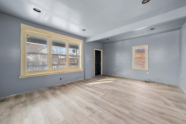8545 S Saginaw Ave, Chicago, IL 60617 - spare room featuring plenty of natural light and wood finished floors