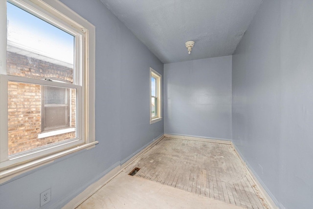 8545 S Saginaw Ave, Chicago, IL 60617 - empty room featuring baseboards