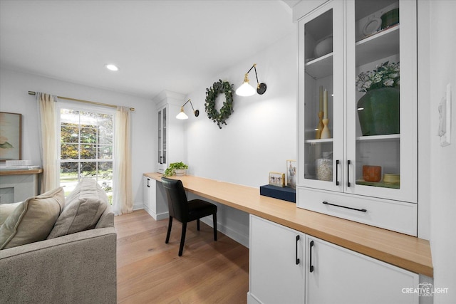 438 Hill Ave, Glen Ellyn, IL 60137 - office space featuring light wood-style flooring, built in desk, and recessed lighting
