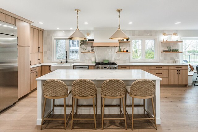 438 Hill Ave, Glen Ellyn, IL 60137 - kitchen featuring open shelves, appliances with stainless steel finishes, backsplash, a kitchen bar, and recessed lighting