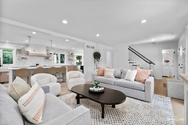 438 Hill Ave, Glen Ellyn, IL 60137 - living area with light wood finished floors, stairs, and recessed lighting