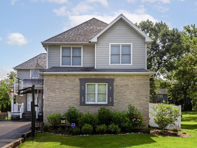 1213 Prairie Ave, Barrington, IL 60010 - view of front of house with a front lawn, brick siding, and a shingled roof