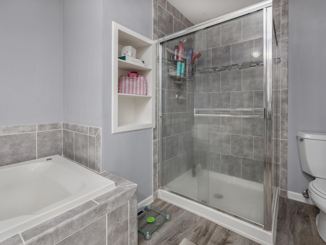1213 Prairie Ave, Barrington, IL 60010 - full bathroom featuring a bath, a shower stall, and wood finished floors