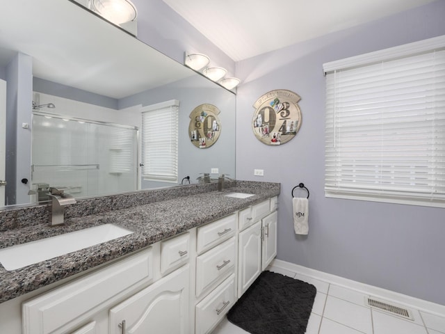 1213 Prairie Ave, Barrington, IL 60010 - full bath with tile patterned floors, double vanity, a shower stall, and healthy amount of natural light