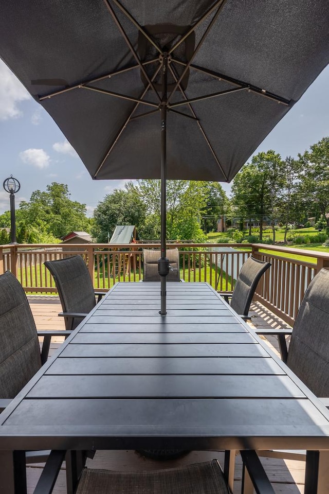 1213 Prairie Ave, Barrington, IL 60010 - wooden deck with outdoor dining area and view of wooded area
