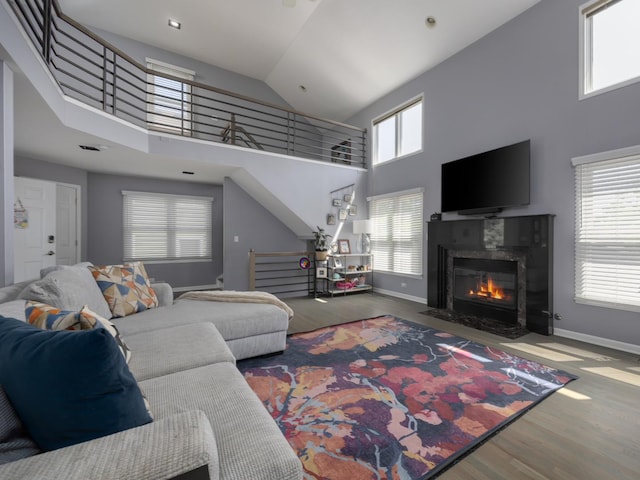 1213 Prairie Ave, Barrington, IL 60010 - living room with wood finished floors, a towering ceiling, a premium fireplace, and stairway