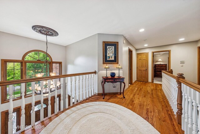 3104 Royal Fox Dr, Saint Charles, IL 60174 - corridor with wood finished floors, recessed lighting, and an upstairs landing