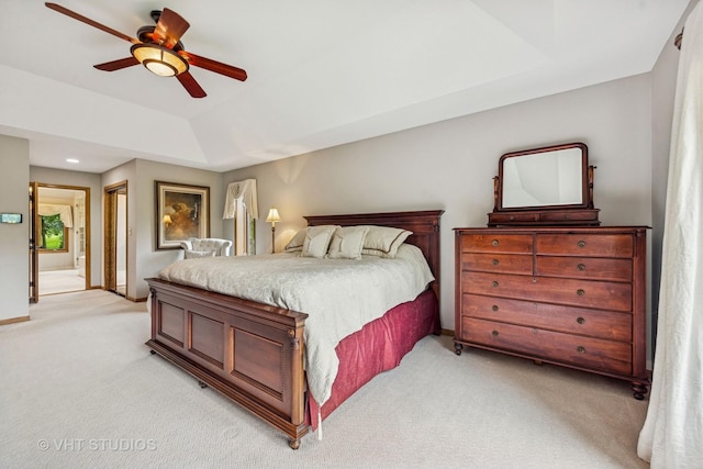 3104 Royal Fox Dr, Saint Charles, IL 60174 - bedroom with light carpet, a tray ceiling, connected bathroom, and ceiling fan