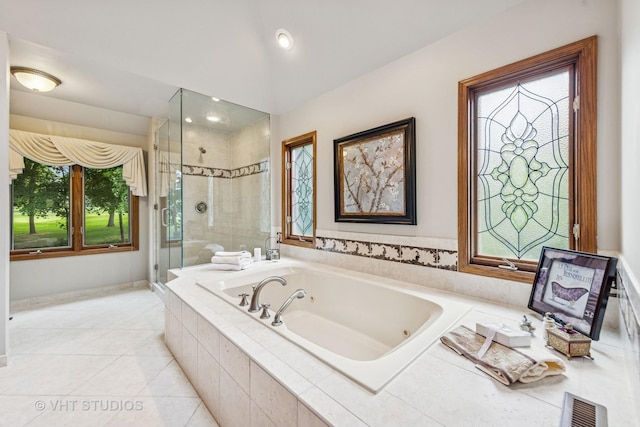 3104 Royal Fox Dr, Saint Charles, IL 60174 - full bathroom featuring a stall shower, a whirlpool tub, healthy amount of natural light, tile patterned flooring, and vaulted ceiling