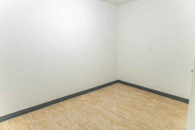 1702 E State St, Rockford, IL 61104 - unfurnished room with baseboards
