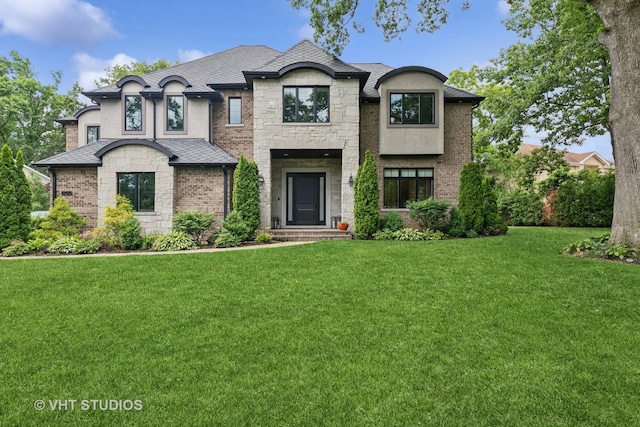 1200 Green Bay Rd, Glencoe, IL 60022 - french country home with stone siding and a front lawn