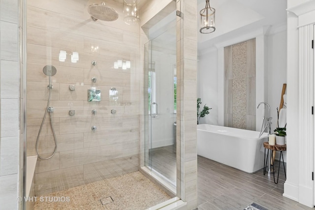 1200 Green Bay Rd, Glencoe, IL 60022 - full bath with a shower stall, a freestanding bath, and wood finished floors