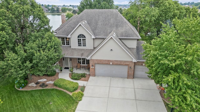 2717 Meadow Path, New Lenox, IL 60451 - traditional home featuring brick siding, concrete driveway, and roof with shingles
