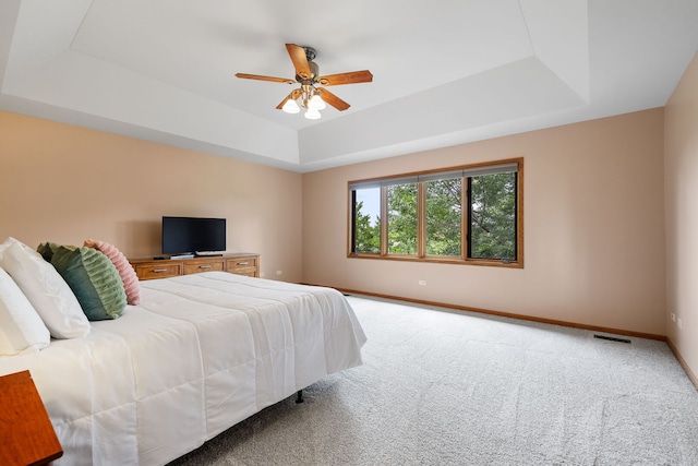 2717 Meadow Path, New Lenox, IL 60451 - bedroom with a raised ceiling, light colored carpet, and ceiling fan