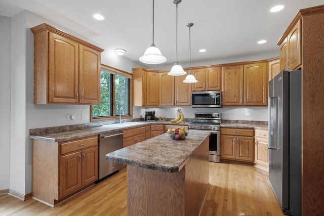 2717 Meadow Path, New Lenox, IL 60451 - kitchen with stainless steel appliances, light wood-type flooring, a kitchen island, recessed lighting, and hanging light fixtures