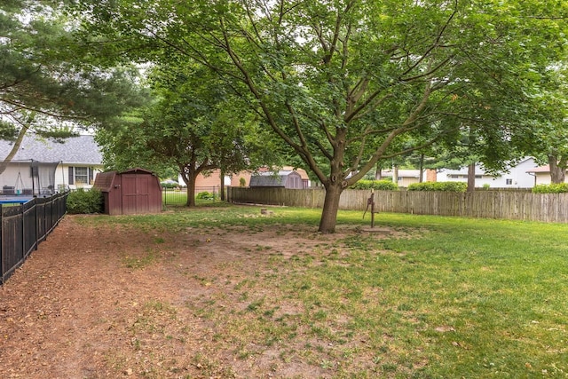 1316 Kirkwood Dr, Pontiac, IL 61764 - fenced backyard with a shed
