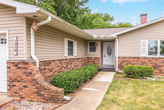 1316 Kirkwood Dr, Pontiac, IL 61764 - entrance to property featuring brick siding and a chimney