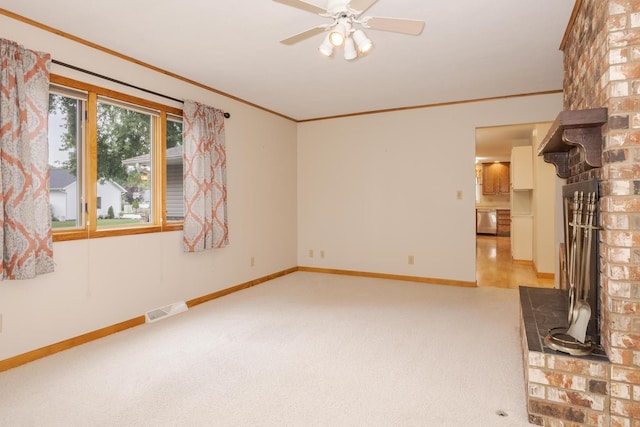 1316 Kirkwood Dr, Pontiac, IL 61764 - unfurnished living room featuring light carpet, a fireplace, a ceiling fan, and crown molding