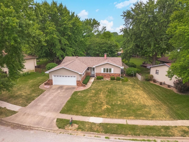 1316 Kirkwood Dr, Pontiac, IL 61764 - ranch-style house with driveway, a front lawn, a garage, brick siding, and a chimney