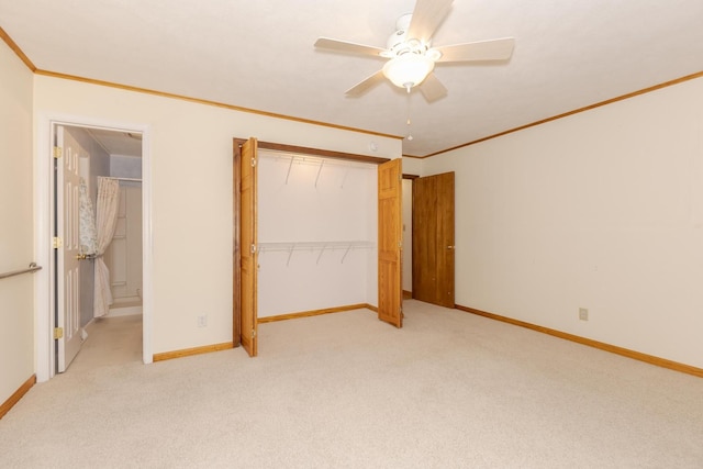 1316 Kirkwood Dr, Pontiac, IL 61764 - unfurnished bedroom featuring light colored carpet, ornamental molding, a closet, and ceiling fan