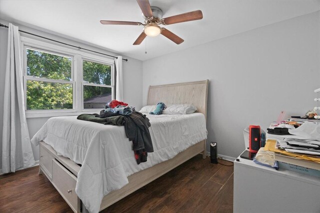 2116 Castle Ct, Waukegan, IL 60087 - bedroom with dark wood-style floors and a ceiling fan