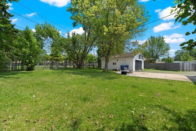 2116 Castle Ct, Waukegan, IL 60087 - view of yard with a garage and driveway