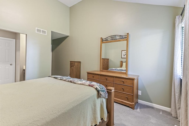 323 Vista Ct Unit C, Minooka, IL 60447 - bedroom with light carpet and lofted ceiling