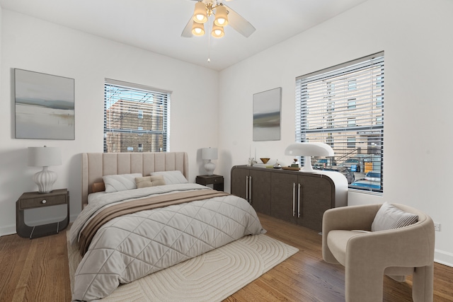 7438 N Hermitage Ave Unit 1E, Chicago, IL 60626 - bedroom featuring wood finished floors and a ceiling fan