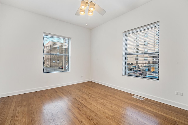 7438 N Hermitage Ave Unit 1E, Chicago, IL 60626 - empty room featuring wood finished floors and a ceiling fan