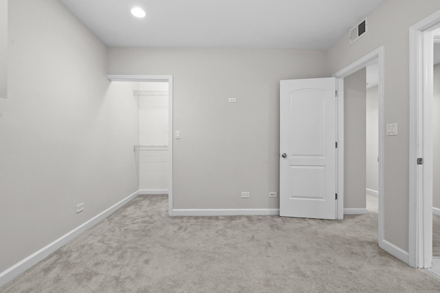 7438 N Hermitage Ave Unit 1E, Chicago, IL 60626 - unfurnished bedroom featuring a spacious closet and carpet flooring