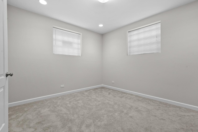 7438 N Hermitage Ave Unit 1E, Chicago, IL 60626 - empty room featuring carpet flooring and recessed lighting