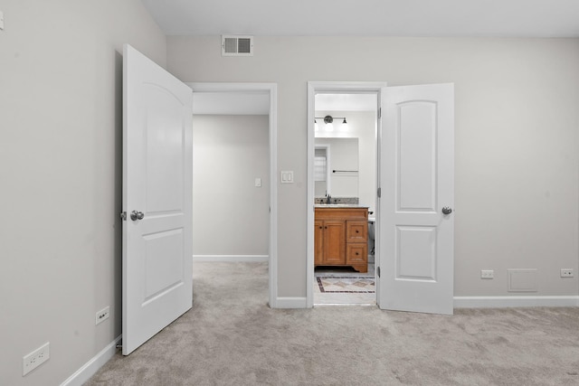 7438 N Hermitage Ave Unit 1E, Chicago, IL 60626 - unfurnished bedroom with light carpet and connected bathroom