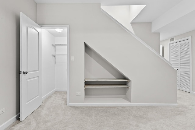 7438 N Hermitage Ave Unit 1E, Chicago, IL 60626 - stairs with carpet and baseboards