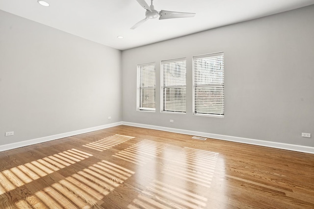 7438 N Hermitage Ave Unit 1E, Chicago, IL 60626 - unfurnished room with ceiling fan, wood finished floors, and recessed lighting