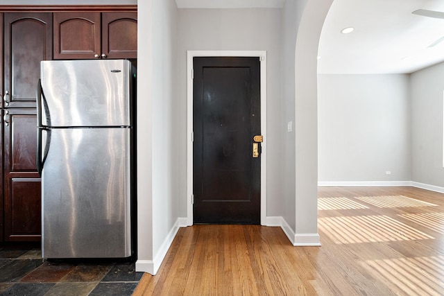 7438 N Hermitage Ave Unit 1E, Chicago, IL 60626 - entryway with arched walkways, recessed lighting, and wood finished floors