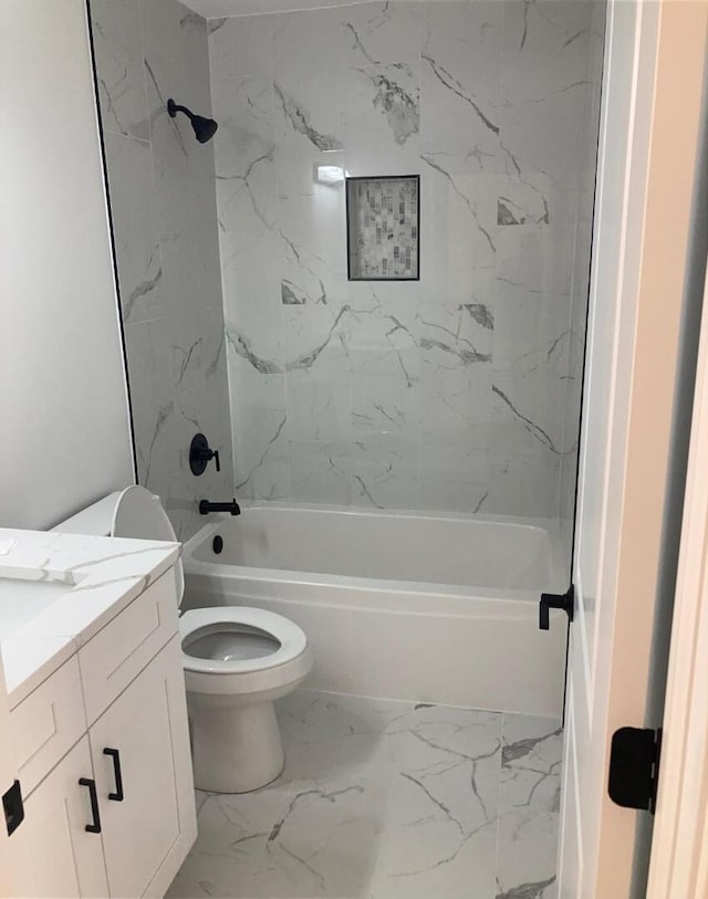939 Saddle Ridge Dr, Joliet, IL 60432 - full bath with marble look tile flooring, vanity, and washtub / shower combination