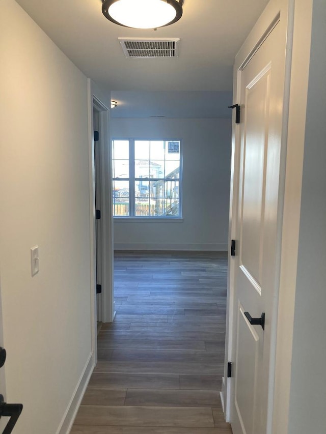 939 Saddle Ridge Dr, Joliet, IL 60432 - corridor featuring wood finished floors and baseboards