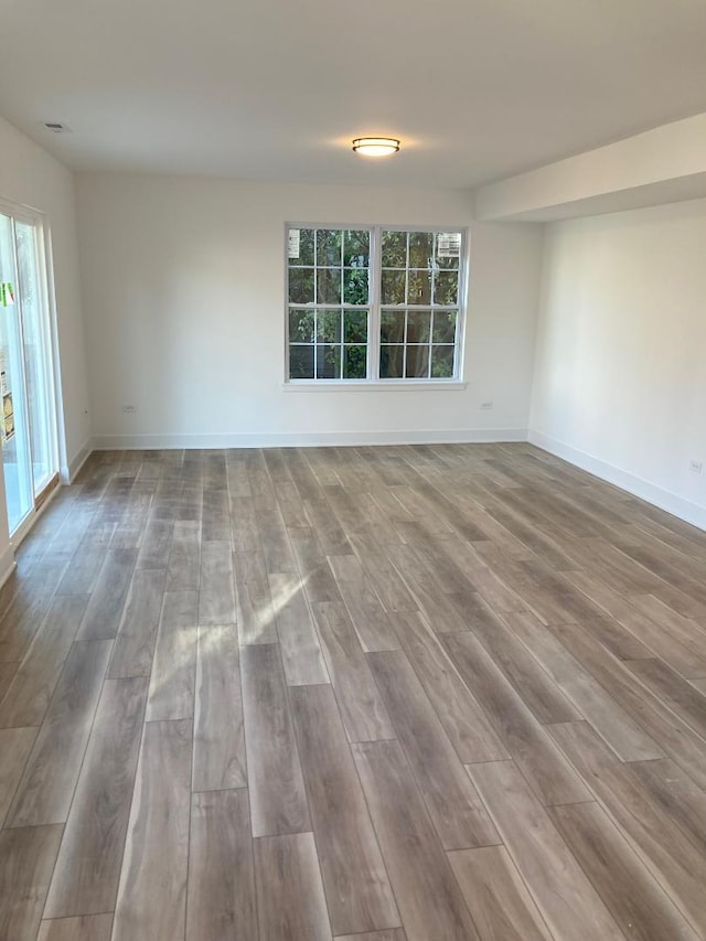939 Saddle Ridge Dr, Joliet, IL 60432 - spare room with plenty of natural light and wood finished floors