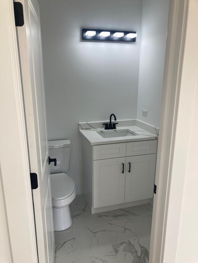 939 Saddle Ridge Dr, Joliet, IL 60432 - bathroom featuring marble finish floors and vanity
