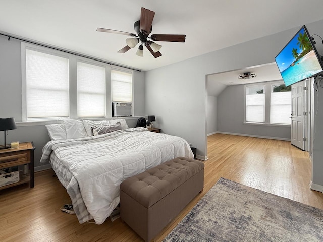 1140 S Harvey Ave, Oak Park, IL 60304 - bedroom with light wood-type flooring, cooling unit, and ceiling fan