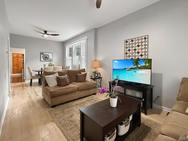 1140 S Harvey Ave, Oak Park, IL 60304 - living room featuring ceiling fan and light wood-style floors