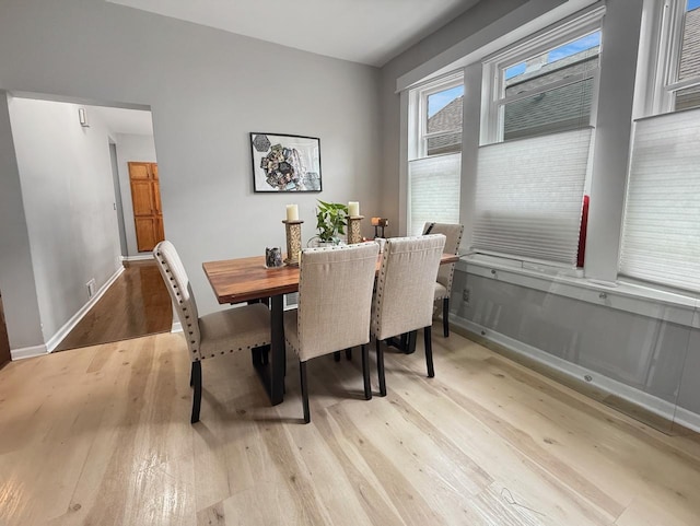 1140 S Harvey Ave, Oak Park, IL 60304 - dining space featuring light wood-type flooring and baseboards