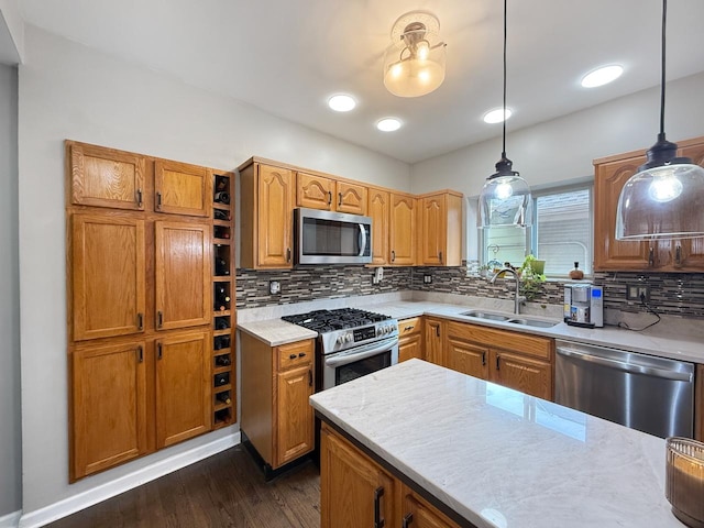 1140 S Harvey Ave, Oak Park, IL 60304 - kitchen featuring stainless steel appliances, tasteful backsplash, dark wood-type flooring, and pendant lighting