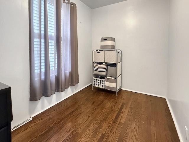 1140 S Harvey Ave, Oak Park, IL 60304 - spare room with wood finished floors and heating unit