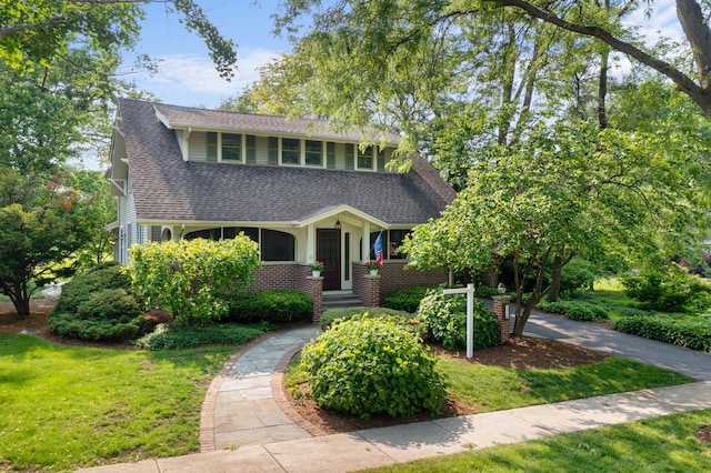 4416 Seeley Ave, Downers Grove, IL 60515 - view of front of house featuring a shingled roof and a front yard