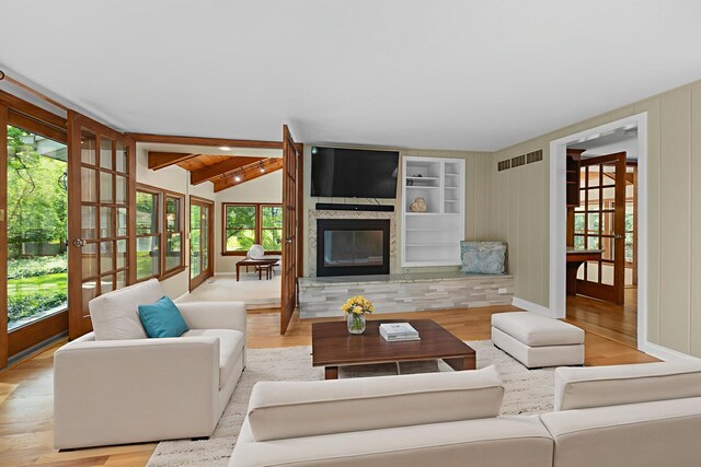 4416 Seeley Ave, Downers Grove, IL 60515 - living room with a large fireplace, wood finished floors, and built in features