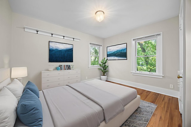 4416 Seeley Ave, Downers Grove, IL 60515 - bedroom with baseboards and wood finished floors